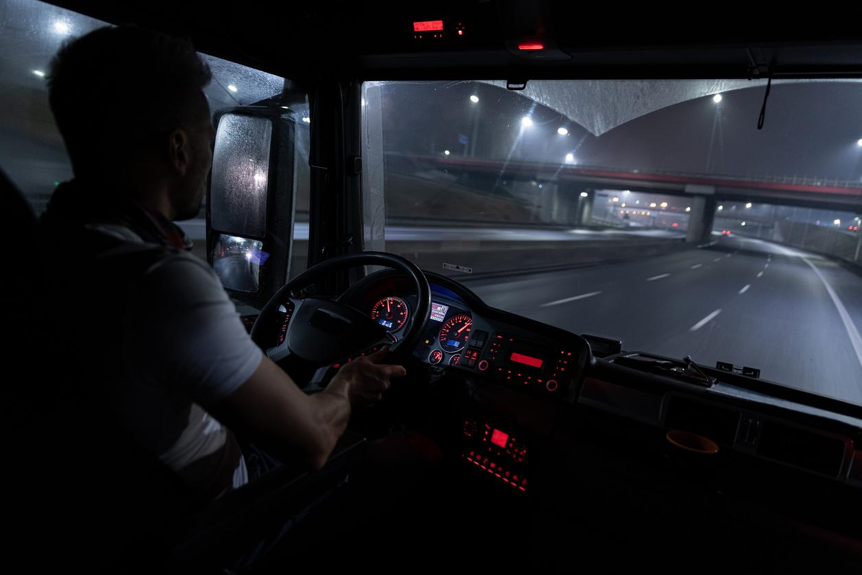 iStock 1298420530 truck driving at night