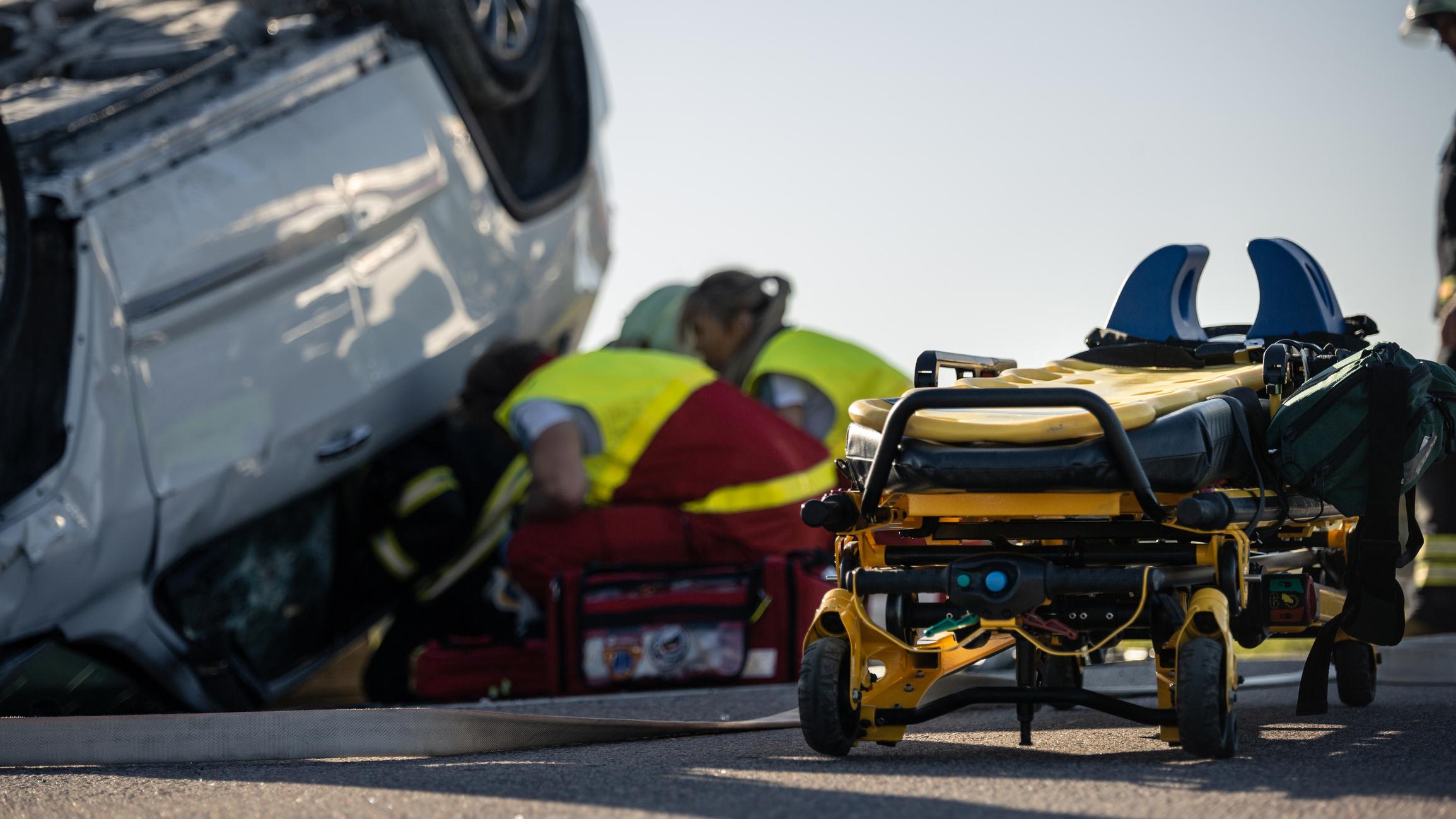 What You Need to Know About Springfield A stretcher next to a car that has been involved in a rollover accident
