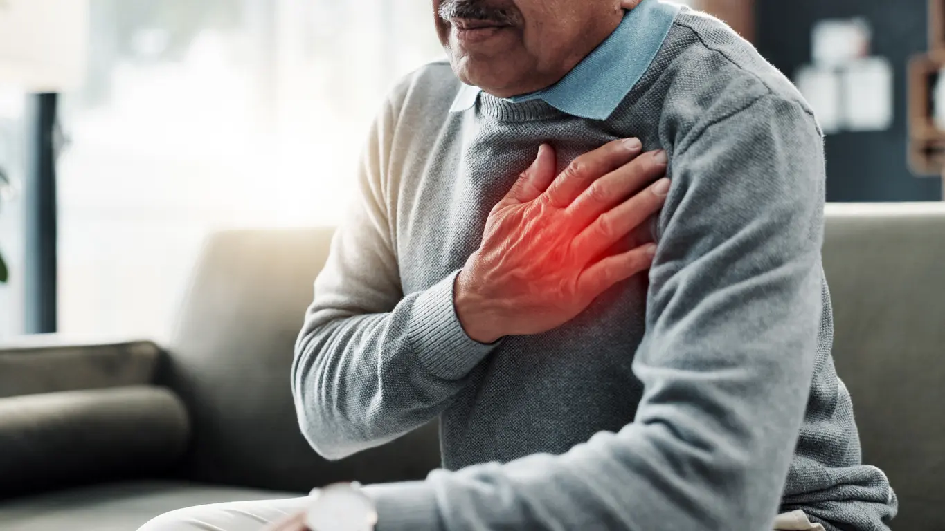 What You Need to Know About Springfield A man clutching his chest with symptoms of a heart attack